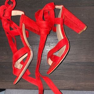 Lace up red heels